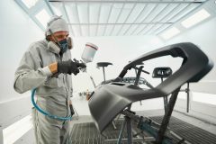 adult-male-doing-color-restoration-for-car-parts-2023-01-13-22-46-23-utc-scaled.jpg