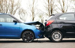 two-damaged-cars-involved-in-road-traffic-accident-2022-05-24-00-01-30-utc-scaled.jpg
